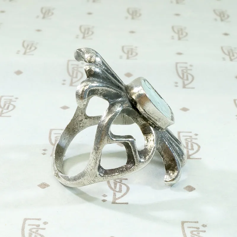 Navajo Sand Cast Silver Ring with Pale Green Turquoise