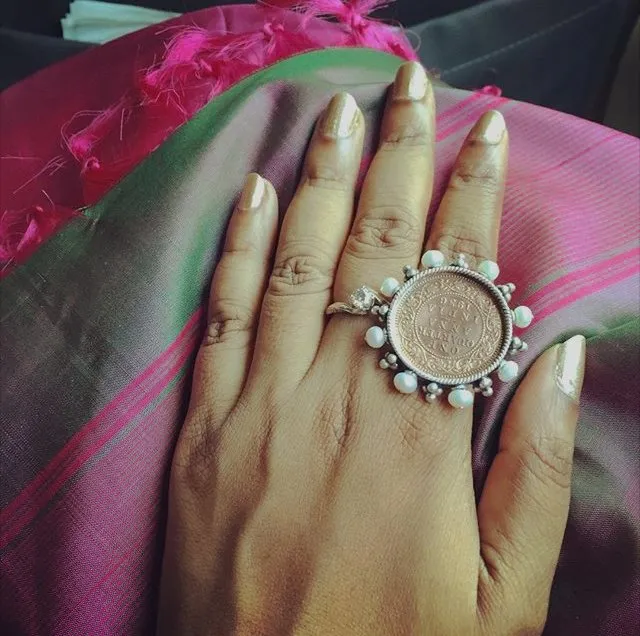 Vintage Indian-coin statement ring framed with pearls