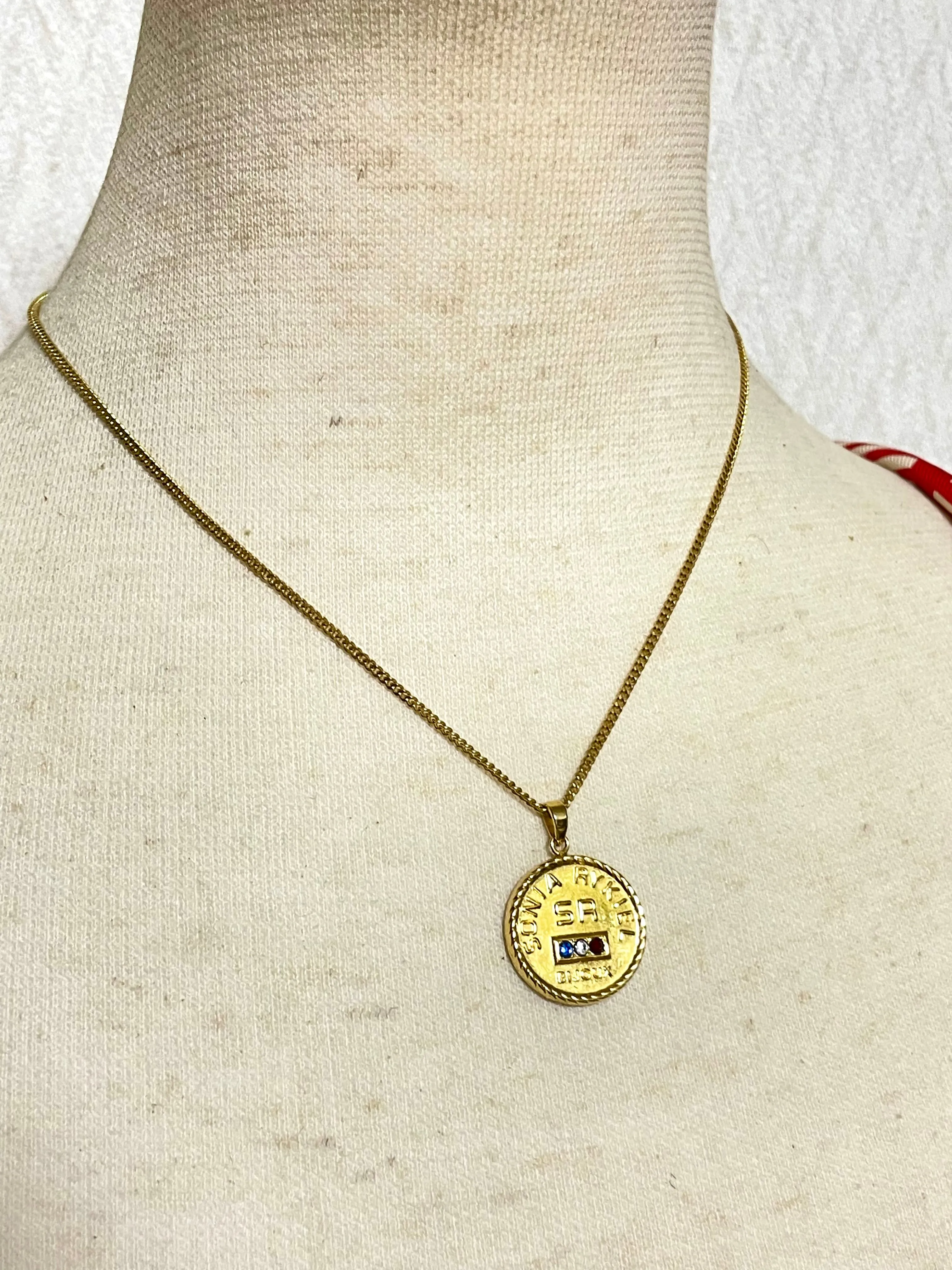 Vintage Sonia Rykiel chain necklace with logo coin top. Perfect vintage jewelry from SR Bijour. 0409081