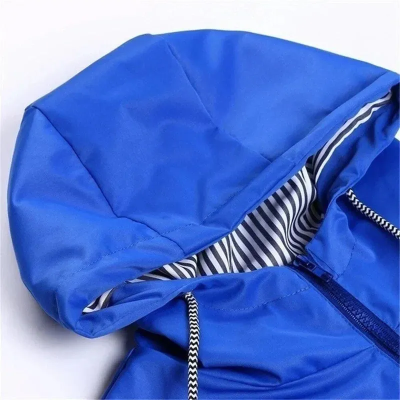 Women's waterproof hoodie trench coat with drawstring waist, zipper and outer pockets